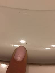 Age spots are flat tan, brown or black spots and usually appear on the face, hands, shoulders and arms.the they include the pills and hormones used in controlling pregnancy such as estrogen.some medicines will lead to sudden dark spots on hands which develop as side effects in certain individuals. Identifying Little Black Biting Bugs Thriftyfun