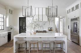 If your table or kitchen island is 36 high then the 24 seat height counter stools are the right selection for a 42 high table then you need to select the 30 seat height bar stools. White Kitchen Island With Gray Saddle Counter Stools Transitional Kitchen
