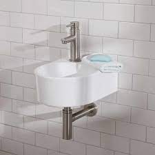 I love pedestal sinks in powder rooms. Small Bathroom Vanities And Sinks For Tiny Spaces Apartment Therapy