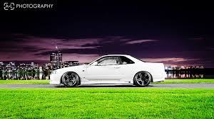 1920x1080 black nissan skyline r34 street fence night lights hd wallpaper. Hd Wallpaper White Coupe Night The City Tuning Gt R Nissan Nissan Skyline Wallpaper Flare