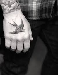 Bird Tattoo On Hand For Boys Unique Tattoo Design Ideas For Men Hand Tattoos For Guys Tattoos For Guys Unique Tattoos For Men