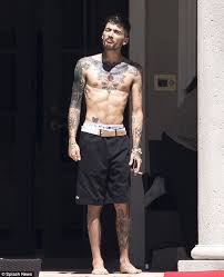 Zayn malik might have a tattoo of gigi hadid's eyes on his chest, and the internet is shook. Zayn Malik Trolled Over Huge Chest Tattoo Of Ex Gigi Hadid Latestnaija Com