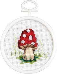 You supply your own fabric and floss. Mushroom Mini Cross Stitch Kit