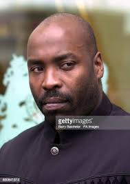 Karate instructor Cliff Brown leaves the High Court in Cardiff. Mr... News  Photo