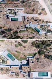 Stories about architecture with green roofs, including homes with living roofs, buildings topped with gardens and grassy plains used as sports pitches. Three Homes With Green Roofs Blend Into This Hillside In Greece