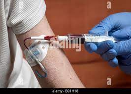 Drawing Blood From A Picc Line With Surgical Gloves (Peripherally Inserted Central  Catheter Stock Photo - Alamy
