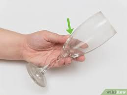 Just run your finger across a wooden table and then across a glass table, and you'll see the difference (and then you'll have to clean it). 4 Ways To Clean Wine Glasses Wikihow