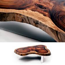 The uneven edges of the concrete table appear unique along with the thick wooden base. The Unique Coffee Tables Made Of Solid Wood Furniture Rotsen Interior Design Ideas Ofdesign