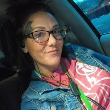 I don't know who this lady is but she was acting really fishy asking for  the woman of the house and something about cleaning. She is with someone  else and they are