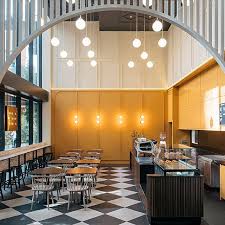 Love This Vibrant Sunny Yellow Interior Of Workshop Bros Cafe In Melbourne Designed By Stu In 2020 Restaurant Interior Design Interior Design Yellow Resturant Design