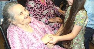 Clawson kindergarten students bring smiles to residents at Haven of Douglas 