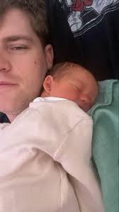 Here's Liam with his baby son Teddy. We're taking him out for lots of walks  in his pram to get him used to the great outdoors 😀