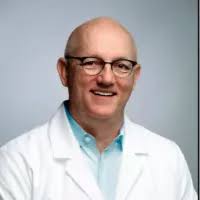 Dr. Mark L. Dake, DDS