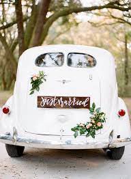 Custom Calligraphy Just Married Sign And Delicate Florals On Our Vintage Wedding Getaway Car Wedding Getaway Car Wedding Car Decorations Vintage Car Wedding
