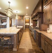 A rustic kitchen with oak cabinetry can be enhanced by the ambient lighting. 40 Unbelievable Rustic Kitchen Design Ideas To Steal