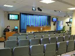 Partial view of journalist with microphone. Live At Wimbledon Inside The New Press Conference Room