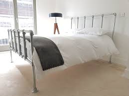 Many of these free plans also give you the option of using reclaimed wood to save money and get a unique look. Diy Industrial Bed With Headboard And Footboard Simplified Building