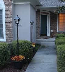 They are made from cast aluminum and glass lenses, with a 2 year warranty. Baytown Solar Lamp Post With Planter American Traditional Garden Atlanta By Gama Sonic Houzz