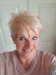 I'm 62, have very short , shaved at sides and back cut. Grows fast just  managable at 8 weeks ! Always colour it myself , cheaper