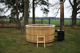 This tub is cheap and relatively easy to build… Wood Burning Hot Tub 2 Meter Siberian Larch External Heater Wooden Hot Tubs And Barrel Saunas
