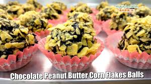 Yang saya akan bahas pada tips dan cara membuat coklat ini yaitu hanya pada pembuatan coklat praline, candy stick/coklat lolipop serta truffle biskuit. Chocolate Peanut Butter Corn Flakes Balls Mykitchen101en Youtube