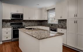 Calacatta oro marble island, perimeter counters, and full height backsplash. Backsplashe Standard Or Full Height Quartz Granite Marble