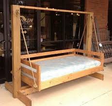 I came across this idea for a trampoline saucer swing on youtube: 50 Fun And Attractive Swing Bed Porch Design Ideas Porch Swing Bed Outdoor Bed Swing Bed Swing