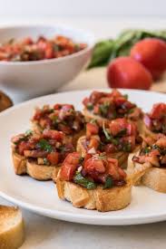 This Classic Tomato Basil Bruschetta Recipe Uses Fresh Roma Tomatoes Basil Garlic A Little Balsamic Bruschetta Recipe Bruschetta Toppings Italian Bruschetta