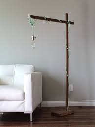 Build A Modern Wood Floor Lamp From A 1x2 Free And Easy Diy Project And Furniture Plans Diy Floor Lamp Modern Wood Floor Lamp Modern Wood Floors