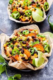 Up Your Nacho Game With These Loaded Southwest Sweet Potato Nachos Crisp Baked Sweet Potat Sweet Potato Hummus Recipe Sweet Potato Nachos Sweet Potato Hummus