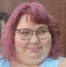 Who is a good hair stylist in Lockport for vivid hair colors?