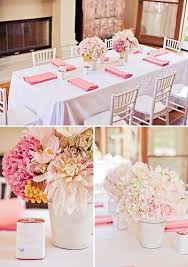 Simple Blush Pink Flower Arrangements White Table Cloth Covers And Darker Shade Pink Napkins Bridal Shower Tables Blush Pink Baby Shower Baby Shower