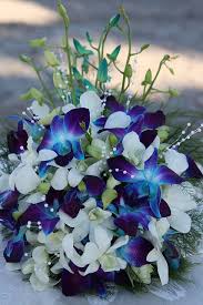 Royal blue wedding bouquets, blue purple orchids bridal bouquet, bridesmaids bouquets, boutonnieres, real touch tiger lily, white roses. Real Wedding Will And Shawntay S Miami Beach Wedding Flores Azuis Para Casamento Arranjos De Flores Do Casamento Centro De Mesa Casamento