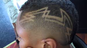 If you haven't, there are several reasons they should be on your haircut list the next time you head to the salon for a new look: Mohawk With Design