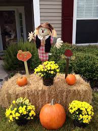 My Fall Yard Decor Yellow Mums Pumpkins Hay Bale And A Cute Little Scarecrow Fall Thanksgiving Decor Fall Yard Decor Fall Outdoor Decor