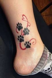 50 Perfect Cat Tattoos Every Cat Lady Will Love Photo Album Sofeminine Pawprint Tattoo Foot Tattoos Print Tattoos