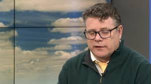 Tony Nour just CONQUERED a huge hill in central South Dakota. A short time  later, Kyle Blakeslee hopped out to run with him... even though she herself  has 9.6 miles to run