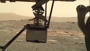 It will make the first attempt at powered flight on another planet on monday, april 19. Nasa S Mars Helicopter Is Slowly Unfolding Beneath The Perseverance Rover Space