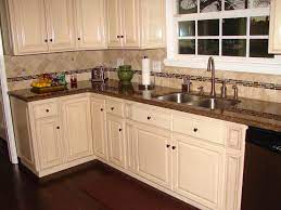 Let your kitchen dazzle with these exquisite raise kitchen cabinets being offered at a host of prices on alibaba.com. Antique White Raised Panel Cabinets And Tropical Brown Granite Counter Tops Kitchen Cabinets And Granite Antique White Kitchen Antique White Kitchen Cabinets