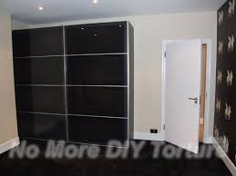 Customized units come in a variety of finishes and even offer options like sliding doors, mirrors and lighting. Ikea Pax Wardrobe Sliding Doors Instructions Wardobe Pedia