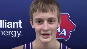 Daniel Meeker gets a fall to secure a medal