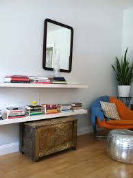 Ikea Lack Shelves In Entry Way Shows A Mix Of Metals And Color Ikea Lack Shelves Ikea Shelves Home Decor