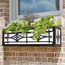 The vintage window box is made of welded and bolted straps of iron and will hold pots or containers for plants. 24 Inch Wrought Iron Window Box Oxford