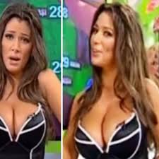WATCH: Weather girl Roxys boobs bulging in corset in another obscene  forecast - Daily Star