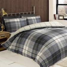 If you are interested in luxury masculine bedding sets and possible arrangement styles to go with it this includes five bedding pieces: Lomond Check Brushed Cotton Bedding Set In Blue Terrys Fabrics