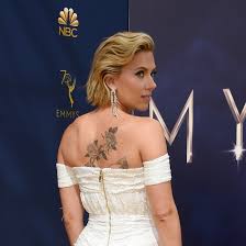 This scarlett johansson back tattoo shows just how much the actress loves art. Scarlett Johansson Tattoos What Can I Do With A Star Tattoo Body Tattoo Art