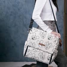 Petunia pickle bottom is a lifestyle brand that offers versatile silhouettes that tote baby and mothering necessities with ease and polish. Petunia Pickle Bottom Disney Minnie And Mickey Mouse Sketch Boxy Backpack Mickey Mouse Bag Disney Bag Bags