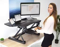 Stand up desk store adjustable height desk. Amazon Com Mount It Height Adjustable Standing Desk Converter 48 Wide Tabletop Sit Stand Desk Riser With Gas Spring Stand Up Computer Workstation Fits Dual Monitors Black Mi 7925 Office Products