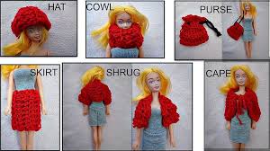 Free knitting chart of a barbie doll's face in a large pink heart. Knitting Barbie Clothes Patterns