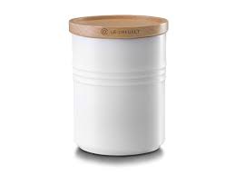 The durable finish resists chipping, scratching and staining. Le Creuset Medium Stoneware Storage Jar With Wooden Lid Shell Pink Jar Storage Stoneware Jar